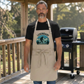 Khaki Port Authority A600 grilling apron with printed design of Bigfoot in the mountings cooking on a grill.