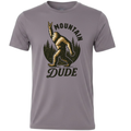 Gray Storm crewneck T-shirt featuring the Mountain Dude Bigfoot graphic with a Sasquatch making a rock-on hand gesture in front of pine trees.